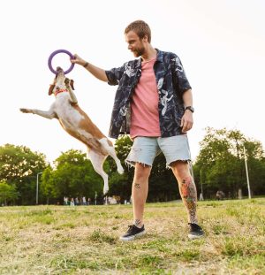 image-of-young-man-smiling-and-playing-with-his-be-2021-08-28-20-05-14-utc.jpg